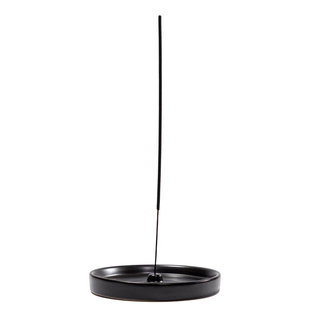 Elegant Black Ceramic Incense Holder with a simple design for home or meditation use