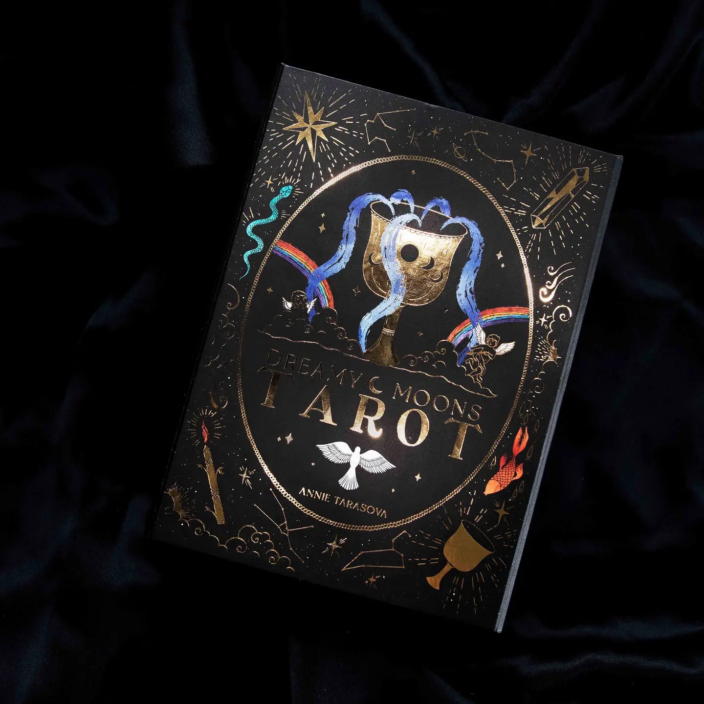 Dreamy Moons Tarot deck gold foil with intricate designs on a black background