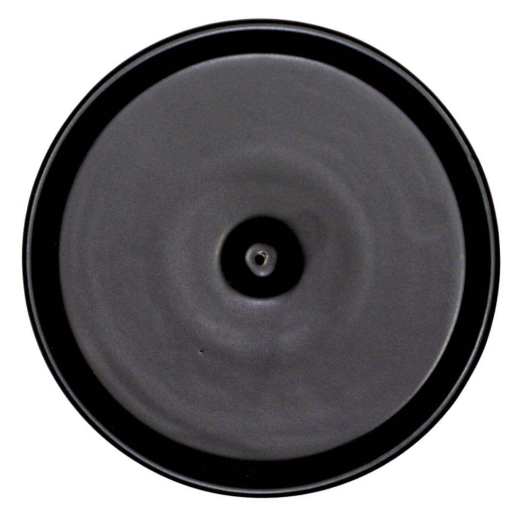 Elegant Ceramic Incense Holder Black with a sleek circular design for a calming ambiance