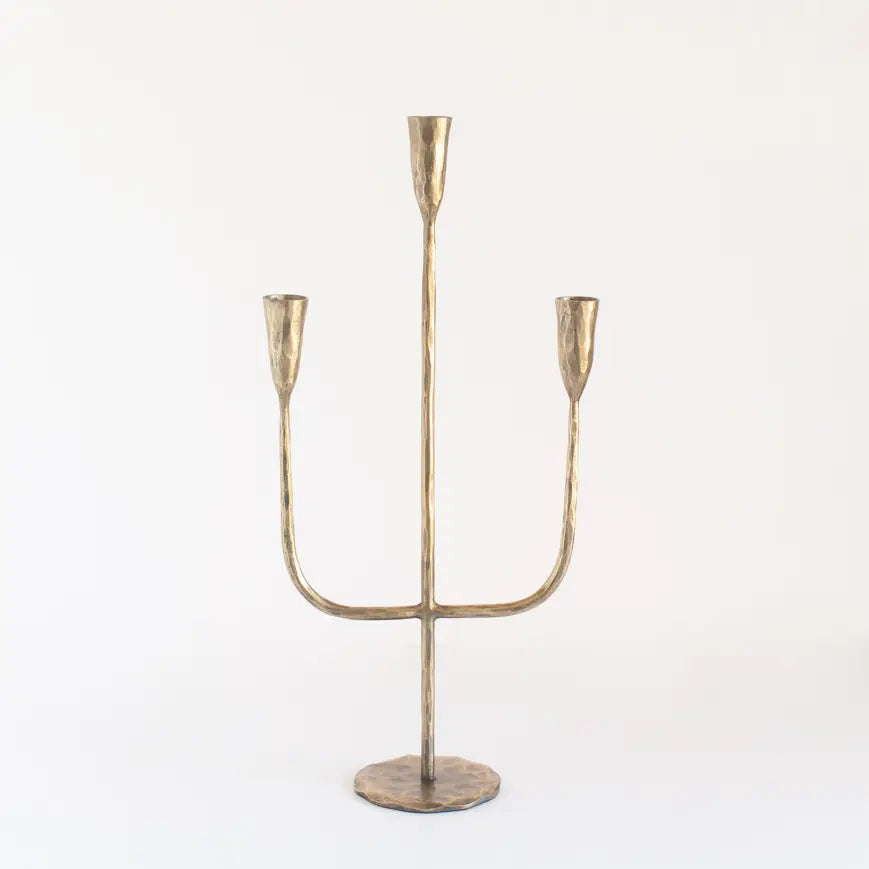Elegant gothic iron candelabra with three tapered candle holders for a dramatic decor accent